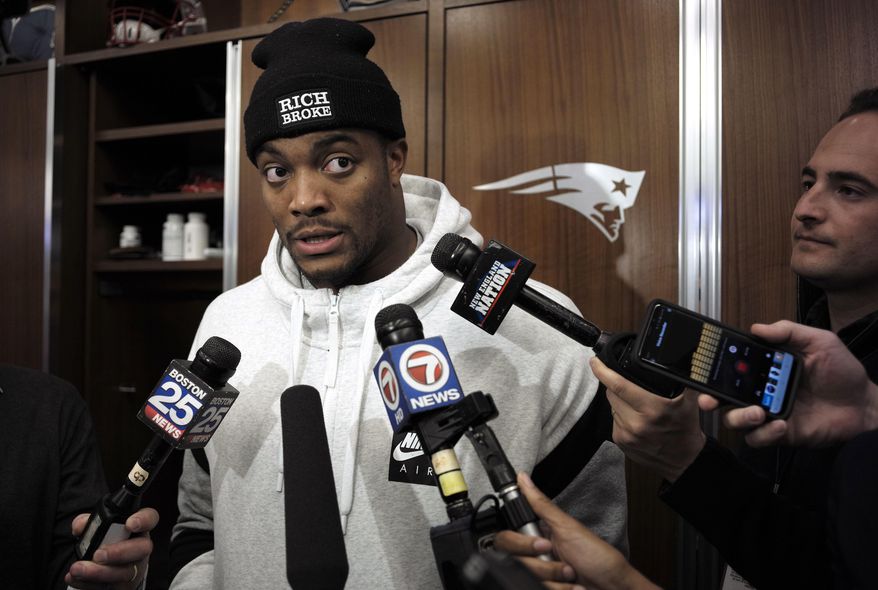 New England Patriots defensive end Trey Flowers faces reporters in the team's locker room following an NFL football practice, Wednesday, Jan. 9, 2019, in Foxborough, Mass. The Patriots are scheduled to host the Los Angeles Chargers in the AFC divisional round game, Sunday, Jan. 13, in Foxborough. (AP Photo/Steven Senne)