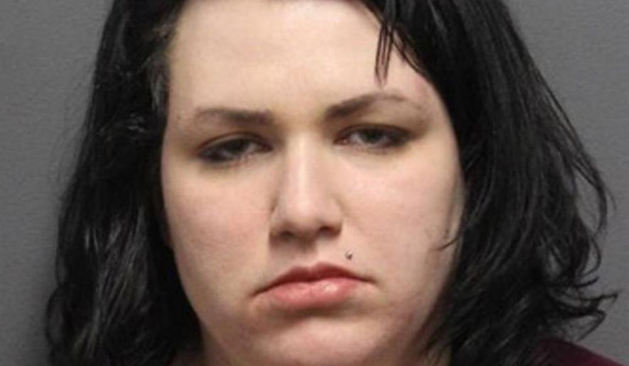 This Monday, Jan. 7, 2019, photo released by the Wyoming, Pa., Police Department shows a booking photo of Ashley Keister. Police in Pennsylvania said Keister smashed her way into a closed police station looking for an officer she&#x27;d been sexually harassing ever since he arrested her. Police said Keister, of Nanticoke, used a large cigarette butt receptacle to smash glass doors into the West Wyoming police building on Monday. (Wyoming, Pa., Police Department via AP)