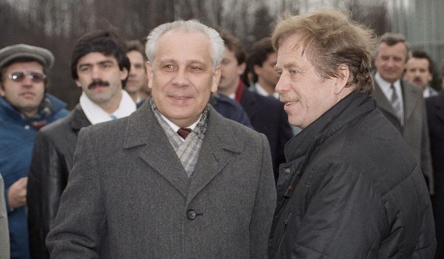 FILE - In this Wednesday, Feb. 28, 1990 file photo, Former Czechoslovak President Vaclav Havel, right, is met at airport by Russian Vice President Anatoly Lukyanov on arrival in Moscow. Anatoly Lukyanov, the speaker of the Soviet parliament who joined a hard-line coup that precipitated the Soviet collapse, has died at 88. Russia's Channel One state television said Lukyanov died Wednesday, Jan. 9, 2019. (AP Photo/Boris Yurchenko, File)