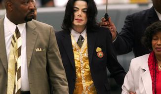 FILE - In this May 25, 2005 file photo, Michael Jackson arrives at the Santa Barbara County Courthouse for his child molestation trial in Santa Maria, Calif. A documentary film about two boys who accused Michael Jackson of sexual abuse is set to premiere at the Sundance Film Festival later this month. The Sundance Institute announced the addition of “Leaving Neverland” and “The Brink,” a documentary about Steve Bannon, to its 2019 lineup on Wednesday. The Sundance Film Festival kicks off on Jan 24 and runs through Feb. 4. (Aaron Lambert/Santa Maria Times via AP, Pool)