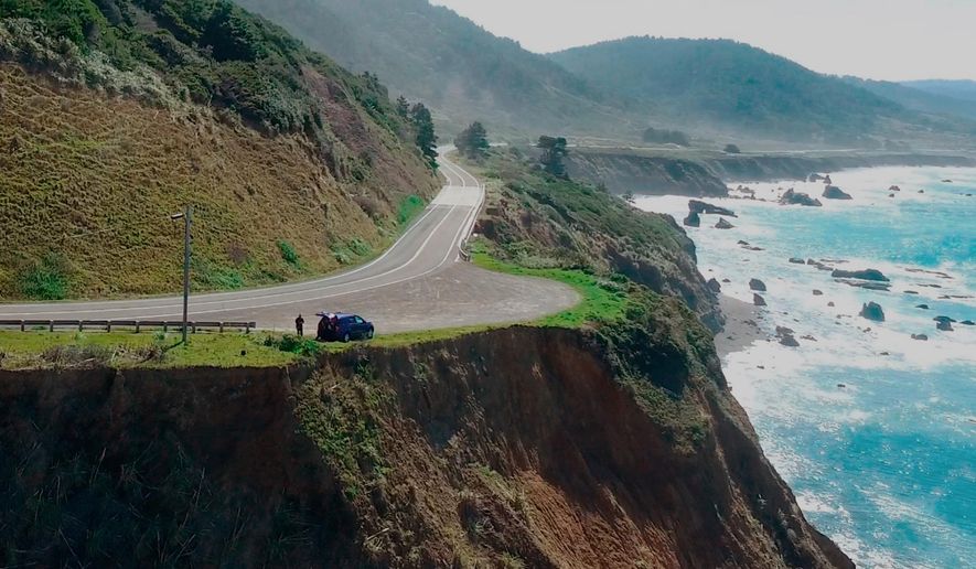FILE - This March 28, 2018, aerial file photo taken from Alameda County Sheriff's Office drone video shows the pullout where the SUV of Jennifer and Sarah Hart was recovered off Pacific Coast Highway 1, near Westport, Calif. Authorities have positively identified human remains found on a Northern California beach as one of six children from a family killed when their SUV plunged off the cliff. The Mendocino County sheriff's department said Wednesday, Jan. 9, 2019, that the partial foot inside a shoe found on the beach belonged to 16-year-old Hannah Hart. Police say the six children and their parents died when Hart drove the SUV off the Pacific Coast Highway and over a 60-foot cliff into the ocean on March 26. (Alameda County Sheriff's Office via AP, File)