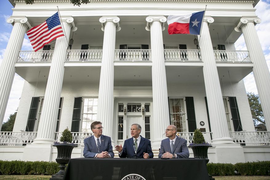 From left, Texas Lt. Gov. Dan Patrick, Texas Gov. Greg Abbott and House Speaker Dennis Bonnen speak at a news conference at the Governor's Mansion, Wednesday, Jan. 9, 2019, in Austin, Texas, on the second day of the 86th legislative session. (Jay Janner/Austin American-Statesman via AP)