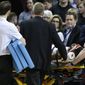 Oklahoma City Thunder forward Nerlens Noel is wheeled off the court on a stretcher in the second half of an NBA basketball game against the Minnesota Timberwolves in Oklahoma City, Tuesday, Jan. 8, 2019. (AP Photo/Sue Ogrocki)