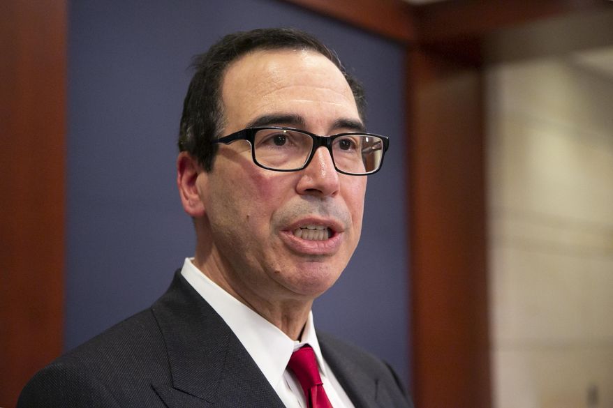 Treasury Secretary Steven Mnuchin speaks to reporters after giving a classified briefing to members of the House of Representatives, telling them that the Trump administration will keep strict U.S. sanctions on the Russian oligarch Oleg Deripaska, on Capitol Hill in Washington, Thursday, Jan. 10, 2019. (AP Photo/J. Scott Applewhite)