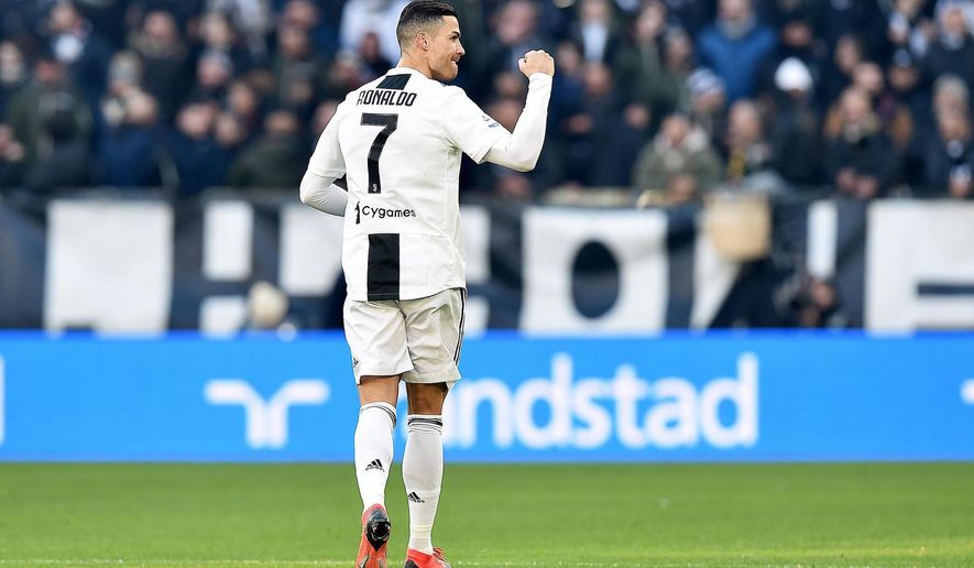 Juventus's Cristiano Ronaldo celebrates after scoring his side's first goal during the Serie A soccer match between Juventus and Sampdoria in Turin, Italy, Saturday, Dec. 29, 2018. (Alessandro Di Marco/ANSA via AP)