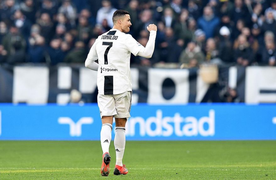 Juventus's Cristiano Ronaldo celebrates after scoring his side's first goal during the Serie A soccer match between Juventus and Sampdoria in Turin, Italy, Saturday, Dec. 29, 2018. (Alessandro Di Marco/ANSA via AP)