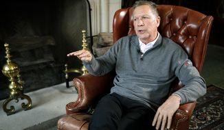  John Kasich sitting for an interview with The Associated Press at the Ohio Governor&#39;s Residence and Heritage Garden, in Columbus.  (AP Photo/John Minchillo, File)