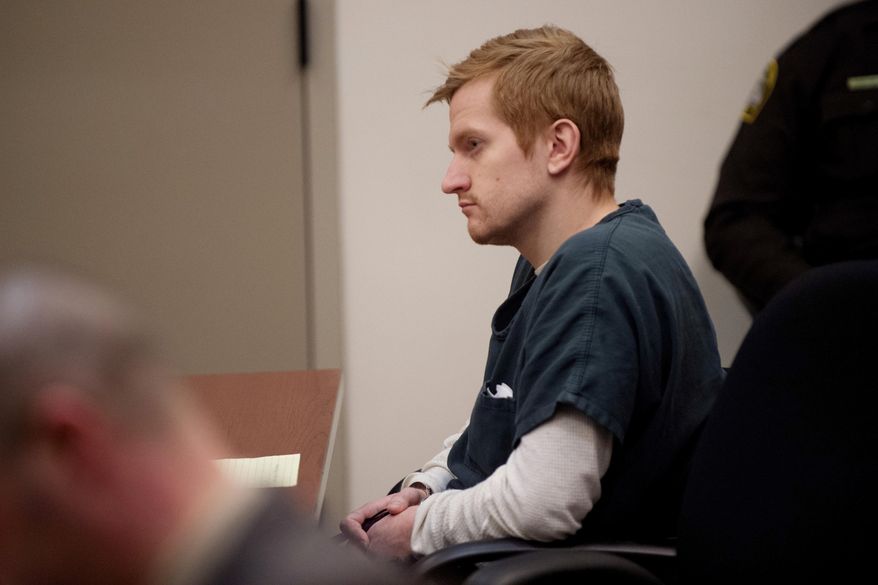 Jared Chance listens to testimony during his preliminary examination at the Kent County Courthouse, Friday, Jan. 11, 2019, in Grand Rapids, Mich. Chance, from Grand Rapids, faces multiple charges, including murder and mutilation of a body, in Ashley Young's death. (Neil Blake/The Grand Rapids Press via AP)