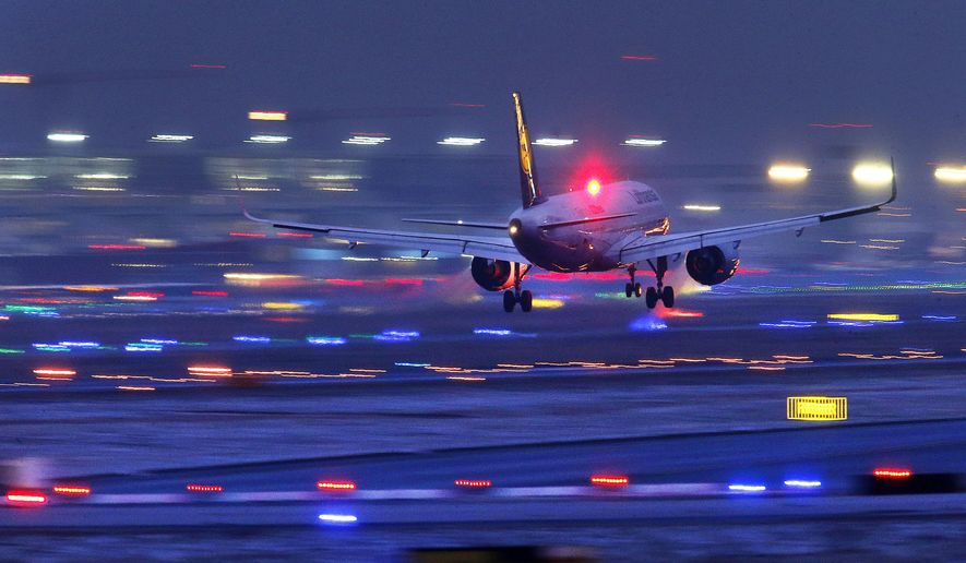 FILE - In this Sunday, Feb. 4, 2018, file photo a Lufthansa aircraft prepares to land at the International Airport in Frankfurt, Germany. A German labor union is calling on security staff at Frankfurt airport to go on strike on Tuesday, Jan. 15, 2019 in a dispute over pay. (AP Photo/Michael Probst, file)