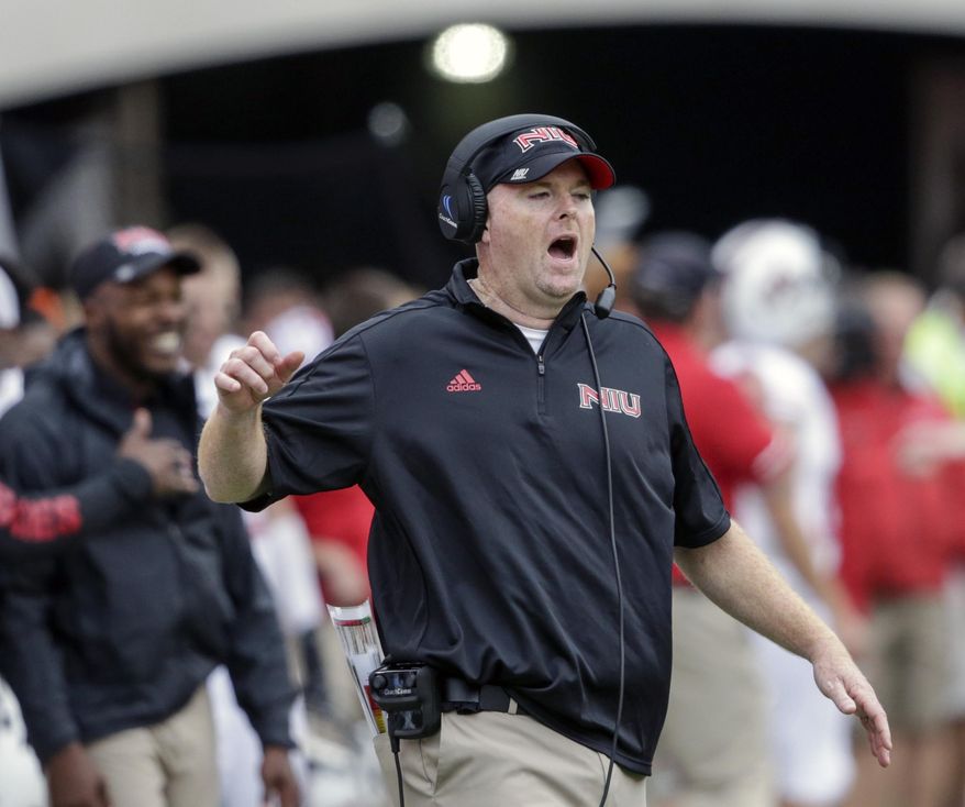 FILE - In this Sept. 16, 2017, file photo, Northern Illinois head coach Rod Carey calls instructions during the second half of an NCAA college football game against Nebraska, in Lincoln, Neb. A person familiar with the move tells The Associated Press that Temple has hired Northern Illinois coach Rod Carey as its next football coach. The person spoke Friday, Jan. 11, 2019, on condition of anonymity because Temple had not made an official announcement. (AP Photo/Nati Harnik, File)