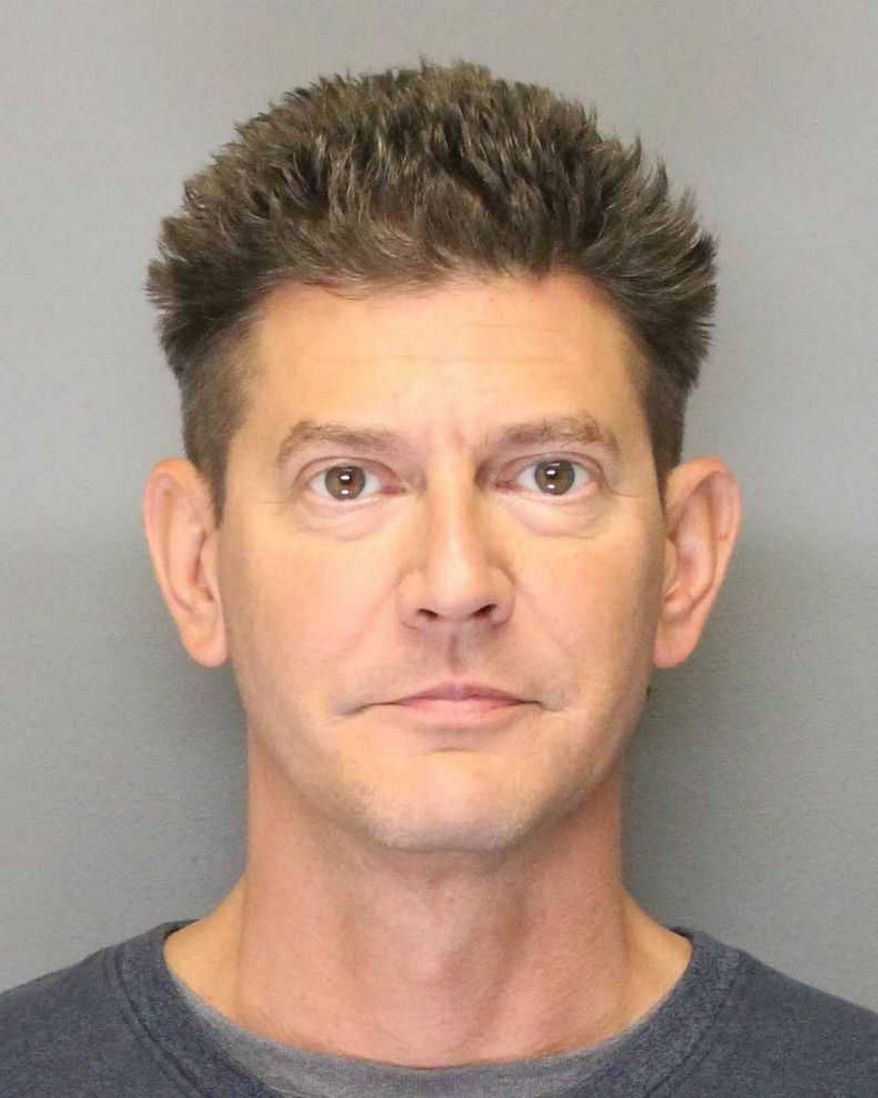 This 2018 booking photo released by the Yolo County Sheriff's Office shows Kevin Douglas Limbaugh. Authorities identified the 48-year-old Limbaugh as the man who shot and killed Davis, Calif., rookie police officer Natalie Corona, 22, on Thursday, Jan. 10, 2019, and later took his own life during a standoff with police. The Sacramento Bee reports that court documents show Limbaugh was convicted in a battery case and agreed in November to surrender a semiautomatic rifle. (Yolo County Sheriff's Office via AP)