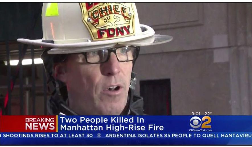 In this image taken from video and provided by WCBS-TV News, New York Fire Department Deputy Chief James Coyne speaks with members of the media after a deadly hi-rise fire, Saturday, Jan. 12, 2019 in New York. An elderly Manhattan couple died in the blaze that engulfed their luxury high-rise apartment before dawn. (WCBS-TV News via AP)