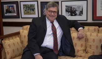 In this Jan. 9, 2019, photo, President Donald Trump&#39;s attorney general nominee, William Barr, meets with Sen. Lindsey Graham, R-S.C., on Capitol Hill in Washington. As attorney general a quarter century ago, William Barr promoted more police and prisons to address violence ravaging American cities. He bemoaned a &amp;quot;moral crisis” and rising secularism. (AP Photo/J. Scott Applewhite)