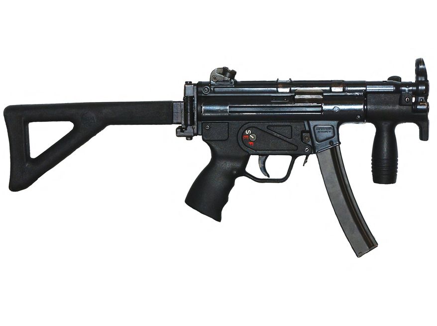 MP5K Submachine Gun - Primary function: Anti-personnel. Length: 12.8 in. Weight: 4.4 lbs. Caliber: 9 mm NATO. Maximum effective range: 100 meters. Cyclic rate of fire: 900 rounds per minute.