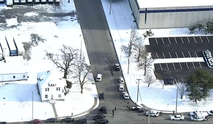 Police respond to a report of an active shooter situation at a United Parcel Service facility in Logan Township, N.J., Monday, Jan. 14, 2019. (WPVI via AP)