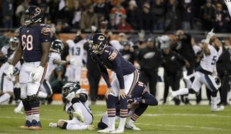 FILE - In this Jan. 6, 2019, file photo, Chicago Bears kicker Cody Parkey (1) reacts after missing a field goal in the closing minute during the second half of an NFL wild-card playoff football game against the Philadelphia Eagles, in Chicago. Bears general manager Ryan Pace wouldn’t say if Parkey will return for another season, and coach Matt Nagy called out the struggling kicker for appearing on the “Today” show last week. Pace was adamant Monday, Jan. 14, 2019, that the Bears need improvement in the kicking game. He also said “those are things that need to play out” when asked if Parkey will return for a second season. (AP Photo/Nam Y. Huh, File)