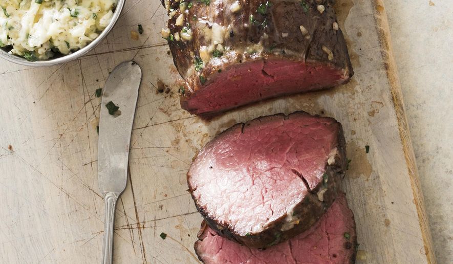 This undated photo provided by America's Test Kitchen in January 2019 shows Roast Beef Tenderloin in Brookline, Mass. This recipe appears in the cookbook "How to Roast Everything." (Joe Keller/America's Test Kitchen via AP)