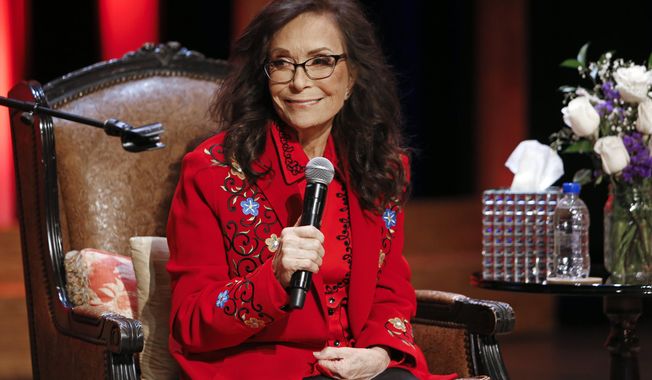 Country music legend Loretta Lynn appears on stage at the Grand Ole Opry House, Monday, Jan. 14, 2019, in Nashville, Tenn., where she announced she will celebrate her 87th birthday with an all-star tribute concert featuring Garth Brooks, Jack White, George Strait and others on April 1. (AP Photo/Mark Humphrey)