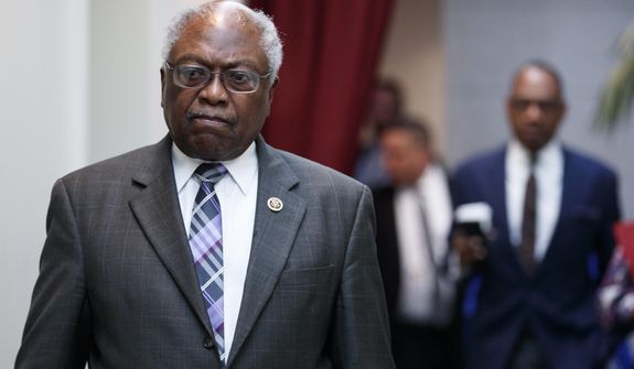 Rep. James Clyburn, D-S.C., walks to a closed Democratic Caucus meeting on Capitol Hill in Washington, Friday, Jan. 4, 2019. (AP Photo/Carolyn Kaster)