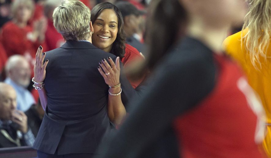 Georgia coach Joni Taylor, right, and Tennessee coach Holly Warlick greet each other before of an NCAA college basketball game in Athens, Ga., Sunday, Jan 13, 2019. (Jenn Finch,/Athens Banner-Herald via AP)