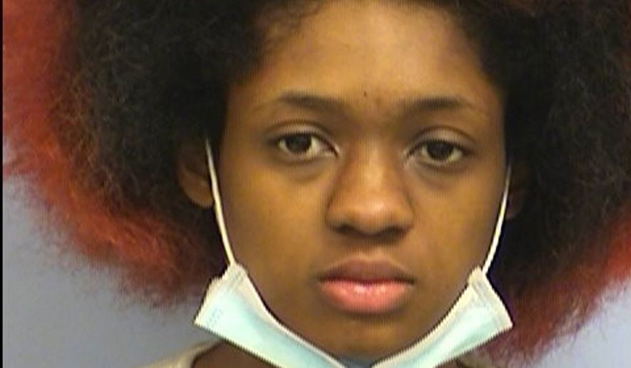 This Monday, Jan. 14, 2019 booking photo released by Austin Police Department shows Autumn King. The Central Texas woman has been charged in the death of her boyfriend after police say she reported posing with a rifle and accidentally shooting him as he planned to take her photo. Travis County jail records show 20-year-old King was being held Tuesday, Jan. 15, 2019, on a manslaughter charge. (Austin Police Department via AP)