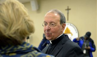 Archbishop William Lori, of Baltimore, attends a press briefing at the archdiocese&#39;s headquarters in Baltimore, Tuesday, Jan 15, 2019. Catholic leaders in Baltimore say they&#39;ve delivered thousands of files to Maryland&#39;s top law enforcement official amid an investigation into child sex abuse. At the Tuesday event for reporters, Lori said Baltimore&#39;s archdiocese is cooperating fully with Attorney General Brian Frosh&#39;s ongoing probe.  (AP Photo/David McFadden)