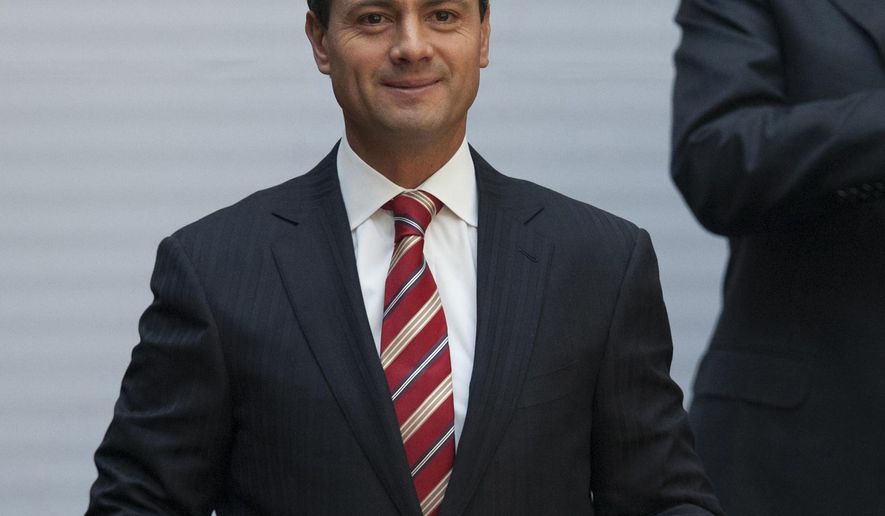 FILE- In this Feb. 25, 2013 file photo, Enrique Pena Nieto, the president of Mexico, is seen at the National Palace in Mexico City. On Tuesday, Jan. 15, 2019, Alex Cifuentes, a Colombian drug trafficker, testified in a New York courtroom that Mexican cartel leader Joaquin &amp;quot;El Chapo&amp;quot; Guzman boasted about paying a $100 million bribe to the former president of Mexico.  Cifuentes was testifying at Guzman&#39;s drug trafficking trial. (AP Photo/Alexandre Meneghini, File)
