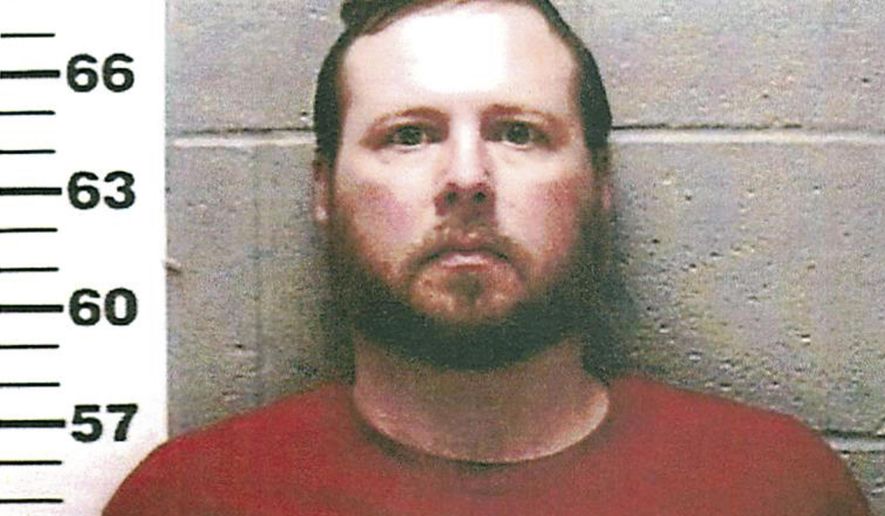 FILE - This undated photo provided by the Jersey County States Attorney in Jerseyville, Ill shows Michael L. Roberts. The Illinois father and stepmother face sentencing after pleading guilty to murder in the starvation death of their 6-year-old son, who authorities said weighed just 17 pounds when he died. Roberts and Georgena L. Roberts of Jerseyville face between 20 and 60 years in prison. (Jersey County States Attorney via AP, File)