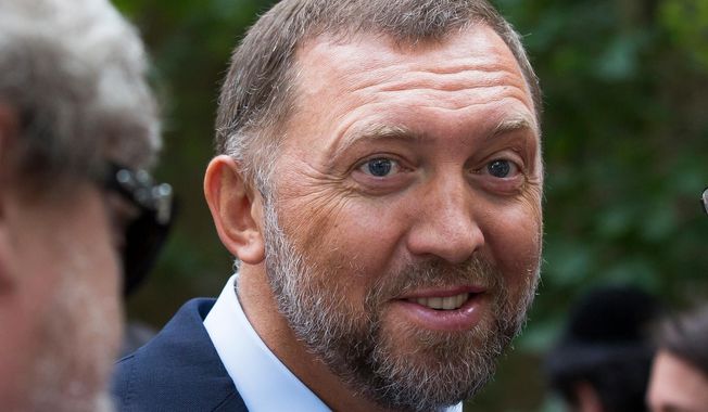 FILE- In this July 2, 2015, file photo, Russian metals magnate Oleg Deripaska attends Independence Day celebrations at Spaso House, the residence of the American Ambassador, in Moscow, Russia. The Senate has narrowly upheld a Treasury Department decision to lift sanctions from three companies connected to Russian oligarch Oleg Deripaska. (AP Photo/Alexander Zemlianichenko, File)