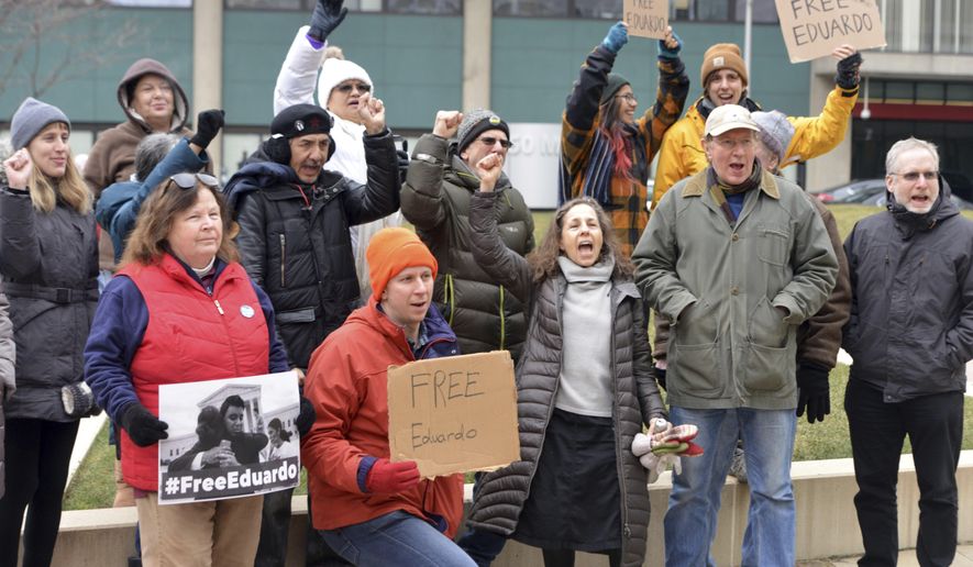 Supporters of immigrant rights Eduardo Samaniego gathered to present a petition with 9,000 signatures asking for his release to the U.S. Immigration and Customs Enforcement office Wednesday, Jan. 16, 2019, in Springfield, Mass. Samaniego, a 26-year old native of Mexico, had been a prominent voice at immigration rallies and marches in Massachusetts, is facing deportation. Supporters are rallying in cities across the country ahead of a Thursday, Jan. 17, hearing that may decide his fate. (Don Treeger/The Republican via AP)