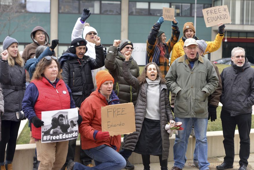 Supporters of immigrant rights Eduardo Samaniego gathered to present a petition with 9,000 signatures asking for his release to the U.S. Immigration and Customs Enforcement office Wednesday, Jan. 16, 2019, in Springfield, Mass. Samaniego, a 26-year old native of Mexico, had been a prominent voice at immigration rallies and marches in Massachusetts, is facing deportation. Supporters are rallying in cities across the country ahead of a Thursday, Jan. 17, hearing that may decide his fate. (Don Treeger/The Republican via AP)