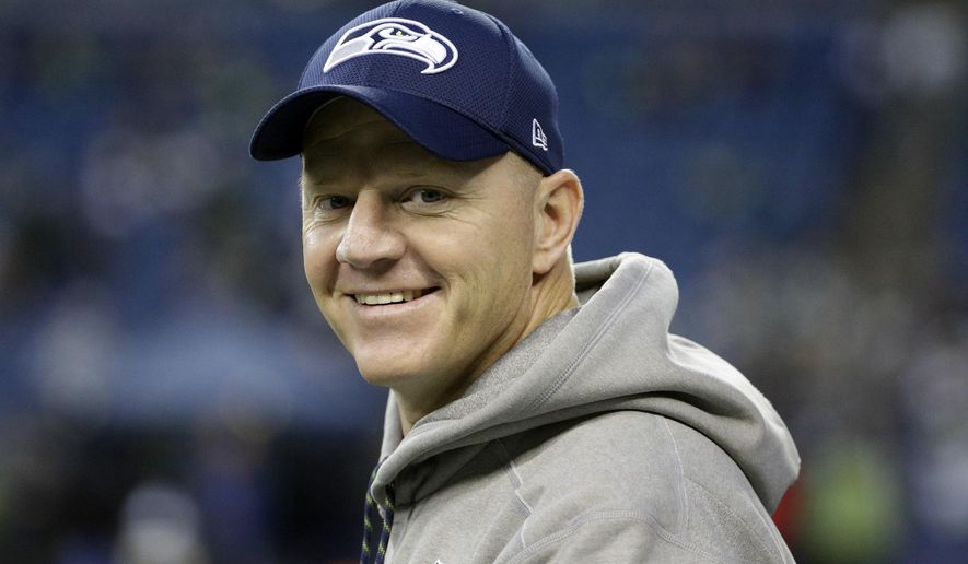 FILE - In this Sunday, Dec. 3, 2017 file photo, Seattle Seahawks offensive coordinator Darrell Bevell walks on the field before an NFL football game against the Philadelphia Eagles in Seattle. The Detroit Lions have hired Darrell Bevell as their new offensive coordinator.Bevell spent seven seasons as Seattle’s offensive coordinator from 2011-17 and was part of a Super Bowl winner with the Seahawks. (AP Photo/Ted S. Warren, File)