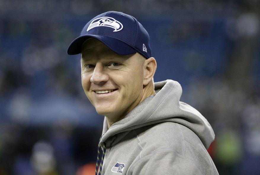 FILE - In this Sunday, Dec. 3, 2017 file photo, Seattle Seahawks offensive coordinator Darrell Bevell walks on the field before an NFL football game against the Philadelphia Eagles in Seattle. The Detroit Lions have hired Darrell Bevell as their new offensive coordinator.Bevell spent seven seasons as Seattle’s offensive coordinator from 2011-17 and was part of a Super Bowl winner with the Seahawks. (AP Photo/Ted S. Warren, File)
