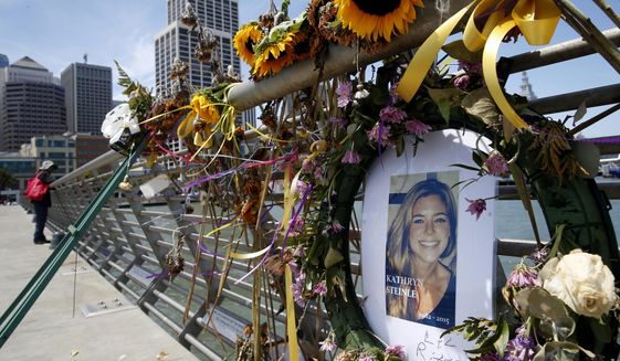 In this July 17, 2015, photo, flowers and a portrait of Kate Steinle remain at a memorial site on Pier 14 in San Francisco. Jose Ines Garcia-Zarate, a Mexican national who touched off a fierce immigration debate for his role in the shooting death of Steinle, is seeking to overturn his felony illegal gun possession conviction, the only charge he was found guilty of after a jury acquitted him of murder. (Paul Chinn/San Francisco Chronicle via AP) **FILE**