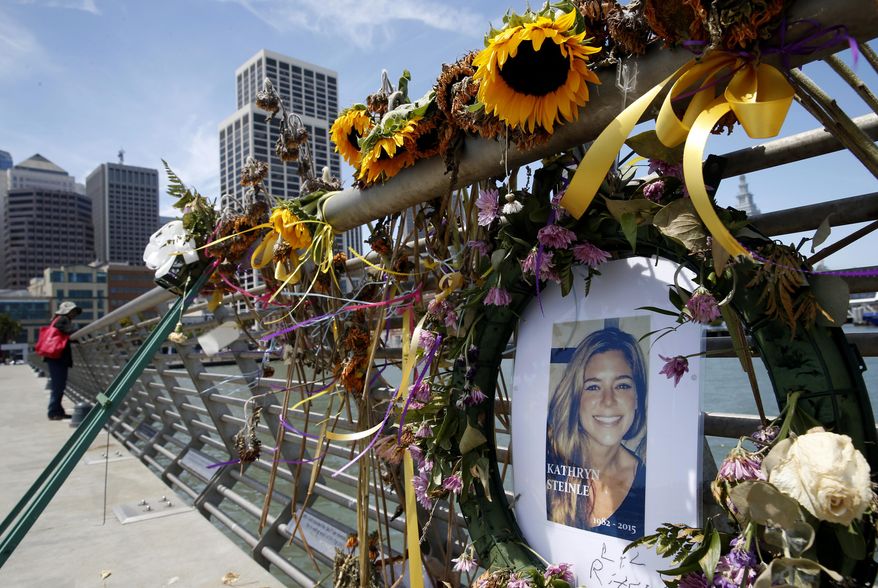 In this July 17, 2015, photo, flowers and a portrait of Kate Steinle remain at a memorial site on Pier 14 in San Francisco. Jose Ines Garcia-Zarate, a Mexican national who touched off a fierce immigration debate for his role in the shooting death of Steinle, is seeking to overturn his felony illegal gun possession conviction, the only charge he was found guilty of after a jury acquitted him of murder. (Paul Chinn/San Francisco Chronicle via AP) **FILE**