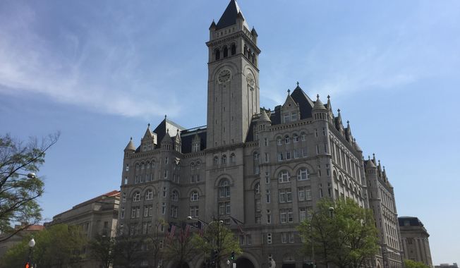 FILE - In this April 13, 2017, file photo, shows the Trump International Hotel in Washington. The inspector general for the General Services Administration says the agency improperly ignored the U.S. Constitution’s emoluments provision outlawing foreign gifts when it approved President Donald Trump&#x27;s management of his Washington hotel soon after his 2016 election. (AP Photos/Beth J. Harpaz, File)