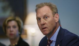 Acting Secretary of Defense Patrick Shanahan speaks at the beginning of a meeting with Japan&#39;s Defense Minister Takeshi Iwaya at the Pentagon, Wednesday, Jan. 16, 2019, about U.S. troops killed in an explosion while conducting a routine patrol in Syria. (AP Photo/Carolyn Kaster)