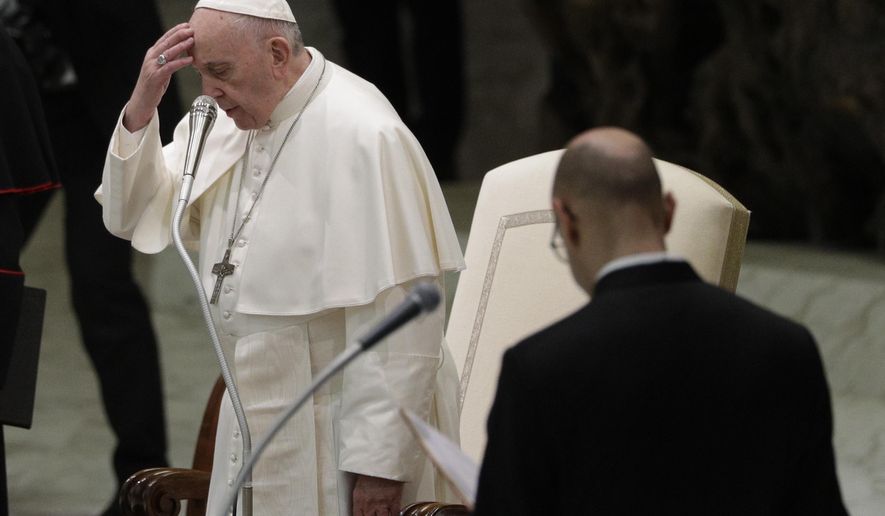 Pope Francis arrives in the Paul VI hall on the occasion his weekly general audience at the Vatican, Wednesday, Jan. 16, 2019. (AP Photo/Gregorio Borgia)