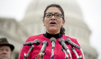 Rep. Rashida Tlaib, D-Mich., speaks at a news conference on Capitol Hill in Washington, Thursday, Jan. 17, 2019, to unveil the &quot;Immediate Financial Relief for Federal Employees Act&quot; bill which would give zero interest loans for up to $6,000 to employees impacted by the government shutdown and any future shutdowns. (AP Photo/Andrew Harnik)