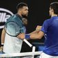 Serbia&#39;s Novak Djokovic, right, is congratulated by France&#39;s Jo-Wilfried Tsonga after winning their second round match at the Australian Open tennis championships in Melbourne, Australia, Friday, Jan. 18, 2019.(AP Photo/Aaron Favila)