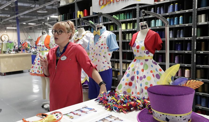 In this Wednesday, Jan. 9, 2019 photo, Harmony McChesney, costume designer discusses the work that goes in to creating costumes at Walt Disney World in Lake Buena Vista, Fla. Durability is a must since the costumes worn by dancers, singers and costumed characters are washed every day. (AP Photo/John Raoux)