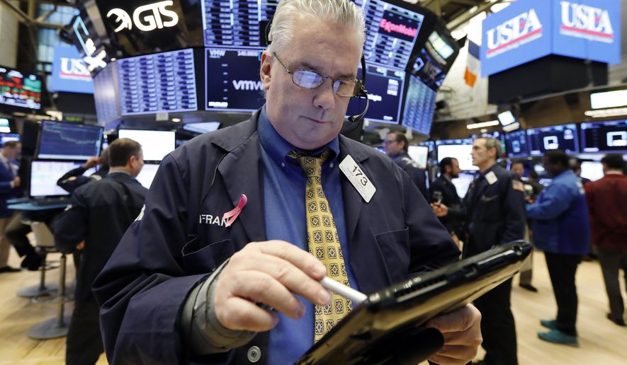 nullFILE- In this Jan. 11, 2019, file photo, trader Frank O'Connell on the floor of the New York Stock Exchange. The U.S. stock market opens at 9:30 a.m. EST on Friday, Jan. 18. (AP Photo/Richard Drew, File)