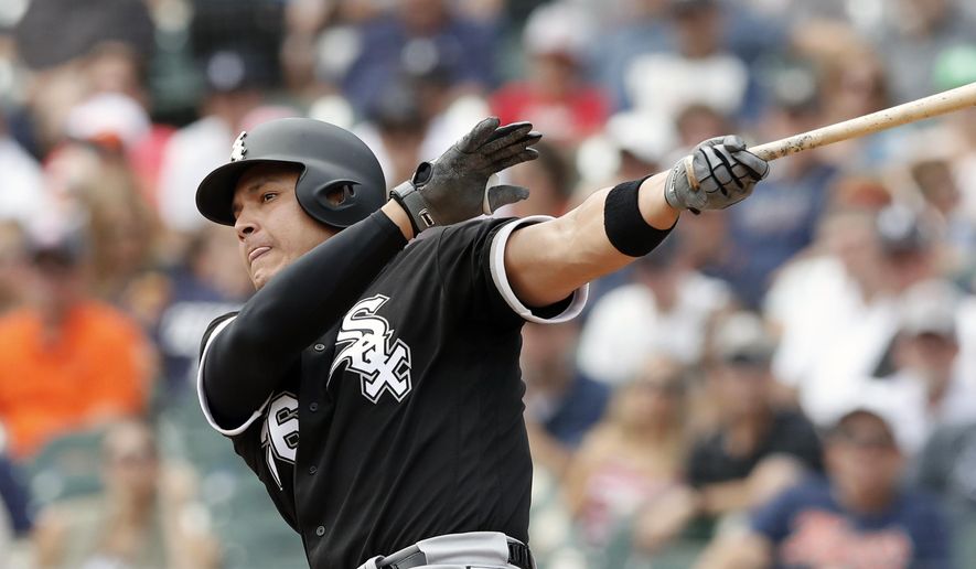 FILE - In this Sunday, Aug. 26, 2018, file photo, Chicago White Sox's Avisail Garcia bats during the first inning of a baseball game against the Detroit Tigers in Detroit. Avisail Garcia can earn up to $6 million as part of his one-year contract with the Tampa Bay Rays.He is guaranteed $3.5 million this season and can earn $2.5 million based on plate appearances. Garcia, coming off arthroscopic surgery on his right knee. He hit a career-high 19 home runs last season but slumped to .236 with 49 RBIs in 93 games. He hit a career-best .330 with 18 homers and 80 RBIs in 136 games in 2017, when he was an All-Star. (AP Photo/Carlos Osorio, File)