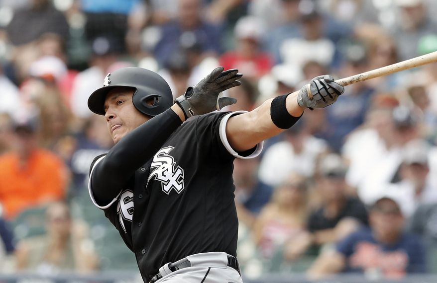 FILE - In this Sunday, Aug. 26, 2018, file photo, Chicago White Sox's Avisail Garcia bats during the first inning of a baseball game against the Detroit Tigers in Detroit. Avisail Garcia can earn up to $6 million as part of his one-year contract with the Tampa Bay Rays.He is guaranteed $3.5 million this season and can earn $2.5 million based on plate appearances. Garcia, coming off arthroscopic surgery on his right knee. He hit a career-high 19 home runs last season but slumped to .236 with 49 RBIs in 93 games. He hit a career-best .330 with 18 homers and 80 RBIs in 136 games in 2017, when he was an All-Star. (AP Photo/Carlos Osorio, File)