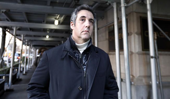 Michael Cohen, former lawyer to President Donald Trump, leaves his apartment building in New York. (AP Photo/Richard Drew, File)