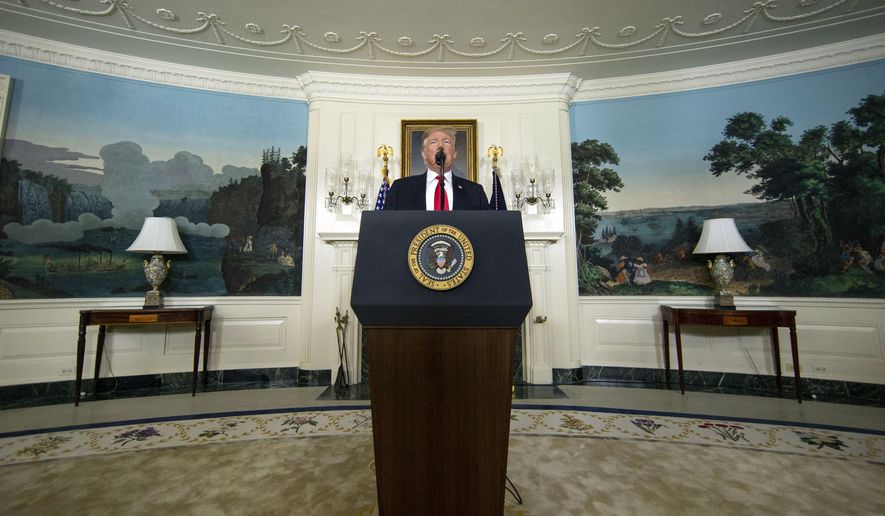 President Donald Trump speaks about the partial government shutdown, immigration and border security in the Diplomatic Reception Room of the White House, in Washington, Saturday, Jan. 19, 2019. (AP Photo/Alex Brandon)