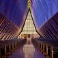 In this April 12, 2017, photo, light shines through the stained glass at the Cadet Chapel at the U.S. Air Force Academy outside Colorado Springs, Colo. The landmark Cadet Chapel is suffering from leaks and corrosion, so the school has drawn up the most ambitious restoration project in the building’s 55-year history. (AP Photo/Thomas Peipert)