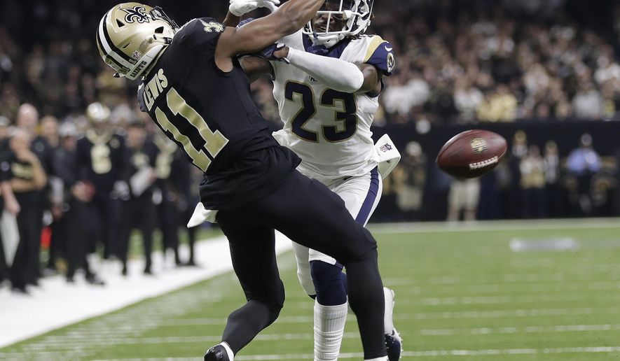 Los Angeles Rams' Nickell Robey-Coleman breaks up a pass intended for New Orleans Saints' Tommylee Lewis during the second half of the NFL football NFC championship game, Sunday, Jan. 20, 2019, in New Orleans. (AP Photo/Gerald Herbert)