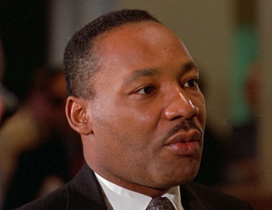 This Oct. 24, 1966, file photo shows Dr. Martin Luther King Jr. in Atlanta. Martin Luther King’s children are quarreling over who owns his Nobel Peace Prize and his Bible. Malcolm X’s heirs are suing to block a book deal to publicize his post-Mecca diary, an agreement brokered by one of their siblings. The fight over Rosa Parks’ estate has her valuable mementos stuck in a New York City warehouse. (AP Photo, File)