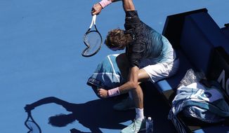 Germany&#39;s Alexander Zverev smashes his racket in frustration during his fourth round match against Canada&#39;s Milos Raonic at the Australian Open tennis championships in Melbourne, Australia, Monday, Jan. 21, 2019. (AP Photo/Kin Cheung)